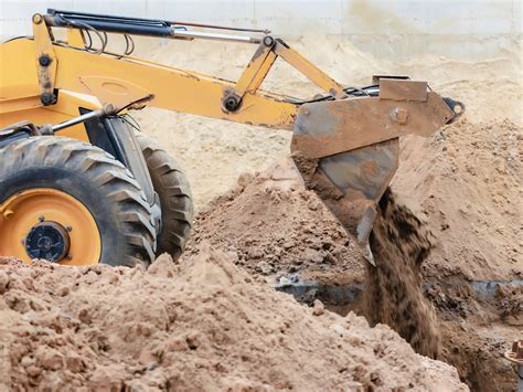 how to backfill with a skid steer|trench backfill steps.